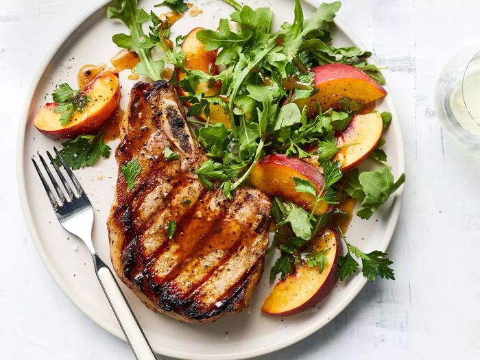 Grilled Pork Chops with Peach-Parsley Salad Recipe