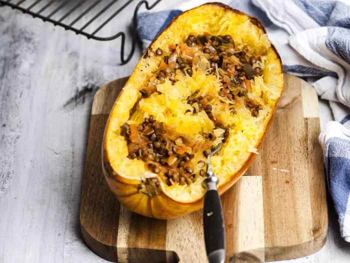 Oven-roasted spaghetti squash served with a vegan bolognese sauce made from lentils, leeks, and carrots