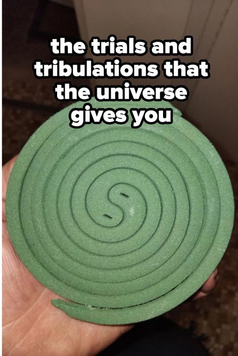 A person carving a triangular shape from honeycomb candy; a green spiral mosquito coil pattern is shown on the right.