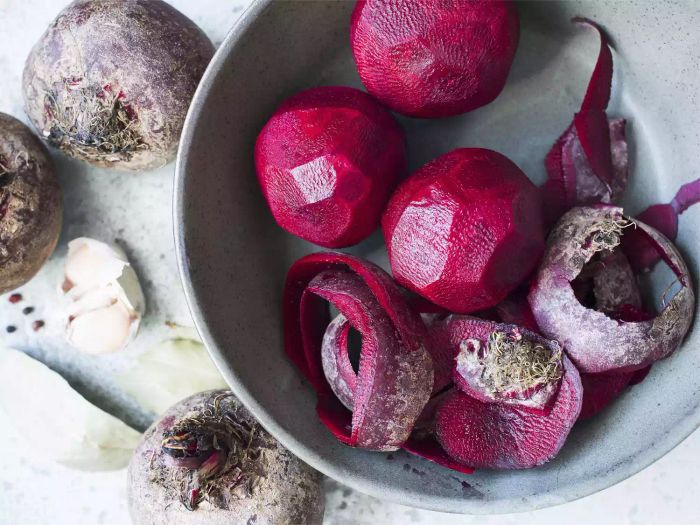 A bowl of peeled beetroots ready for preparation.