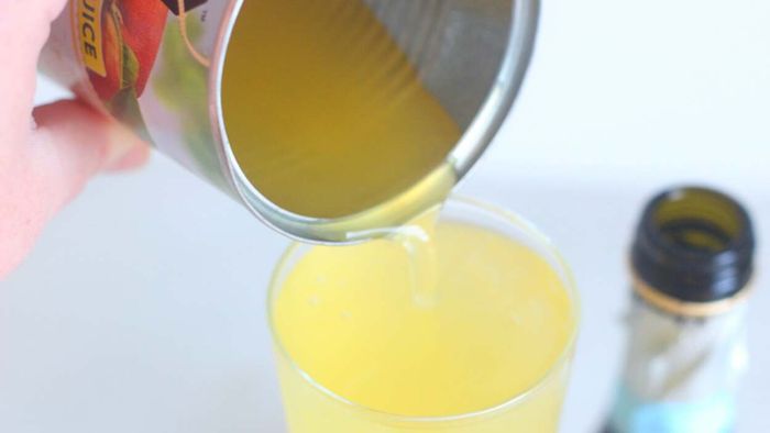 Craft a Bellini Using the Juice From Canned Peaches
