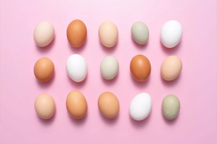 A mix of brown and white eggs