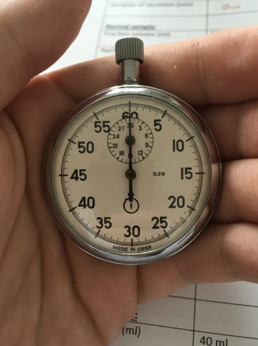 A close-up of a stopwatch labeled 
