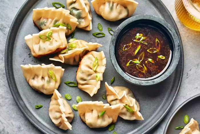Pork and spinach dumplings—bite-sized bundles of flavor—make a perfect snack. Ground pork and fresh spinach come together in these savory dumplings, which are enhanced by oyster sauce, toasted sesame oil, ginger, garlic, and scallions. It’s an irresistible mix of ingredients that’ll satisfy your cravings.