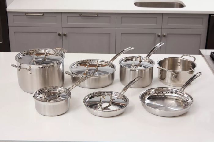 The Cuisinart MultiClad Pro 12-Piece Triple-Ply Stainless Cookware Set displayed on a countertop.
