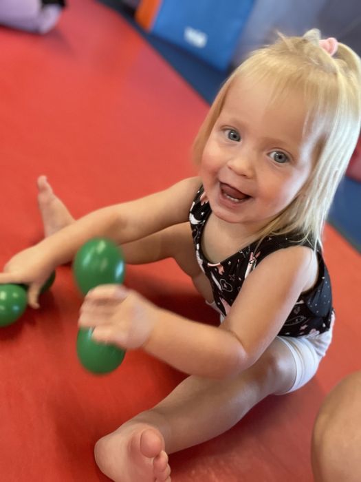 Author's daughter playing with toys