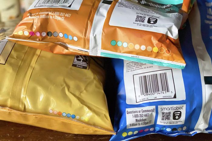 Three packaged food items with circular logos