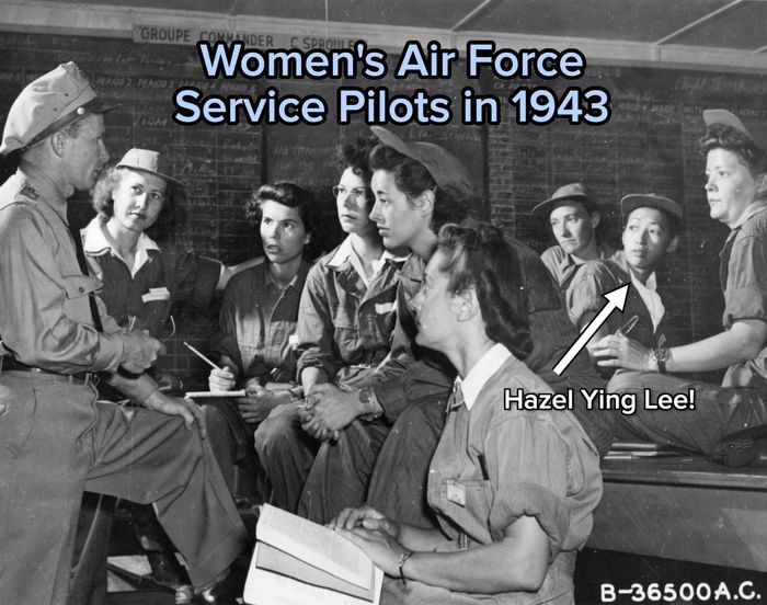 Women of the Women Airforce Service Pilots (WASP) in uniform are seen listening intently to a male officer as he briefs them in front of a large board.