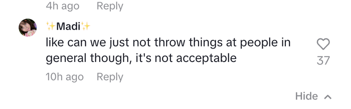 Madi's comment: Speaking out against throwing things at others, calling it unacceptable.
