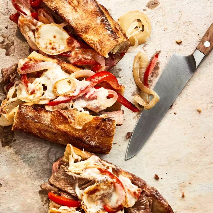 These Sheet Pan Cheesesteak Sandwiches make for a simple yet irresistible twist on the classic Philly cheesesteak. The sheet pan method keeps everything easy and flavorful.
