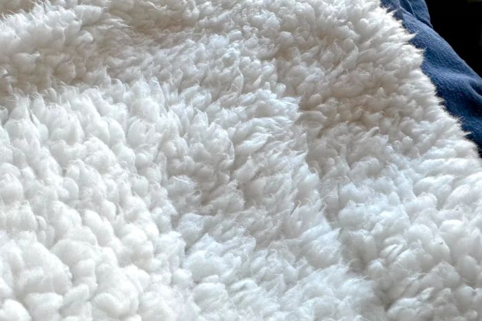 A detailed view of the Sherpa side of the Sunbeam Royal Mink Sherpa Heated Blanket