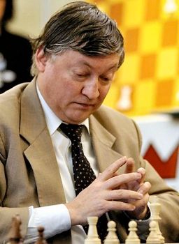 Were it not for Garry Kasparov’s unprecedented rise, Anatoly Karpov would undoubtedly be remembered as the greatest chess player of all time. His reign as World Champion spanned from 1975 to 1985, and again from 1993 to 1999, although the latter period remains the subject of dispute. Karpov’s competitive spirit is still evident, as he continues to play at a high level, ranking 98th in the world. With over 160 first-place finishes in various tournaments, his list of achievements is awe-inspiring. Karpov began playing chess at the tender age of 4, and by the time he was 12, he had enrolled in the prestigious Botvinnik chess school. At age 15, he became the youngest ever Soviet National Master, a feat he shared with Boris Spassky. His success continued as he claimed victory in the 1969 World Junior Championship. Karpov’s journey to the World Championship was solidified after defeating both Korchnoi and Spassky in 1974, earning the right to challenge Fischer. But, when Fischer forfeited the title, Karpov became World Champion by default. His success continued through the years, defending his title against Korchnoi in 1978 and 1981, and achieving a string of nine tournament victories. His performance in the Chess Olympiads is unmatched, losing only 2 games out of 68. Despite his loss of the title to Kasparov in 1985, Karpov’s legacy remains rich with triumphs. His second stint as World Champion came in 1993 following a rift between Kasparov and FIDE. His remarkable 1995 Linares tournament victory remains one of his most celebrated feats.
