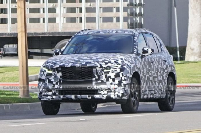 Hình ảnh bằng sáng chế từ Nhật Bản cho thấy chiếc Mazda CX-5 Hybrid 2026 sở hữu động cơ 4 xy-lanh nằm ngang kết hợp với mô-tơ điện ở phía bên phải và hộp số đặt giữa hai thành phần này.