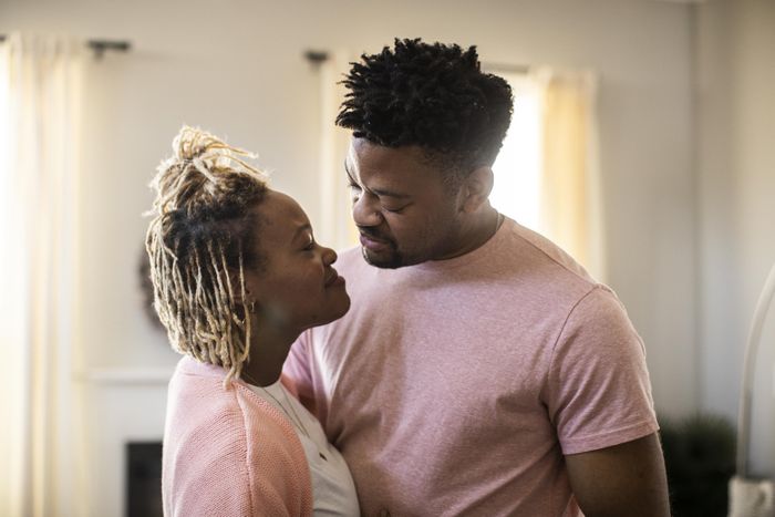 a closeup of a couple embracing
