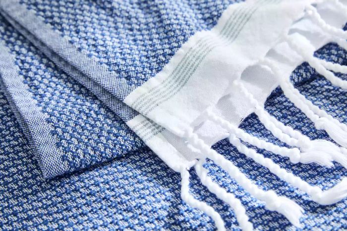 Close-up view of the fringe detail on a Coyuchi Mediterranean Organic Towel.