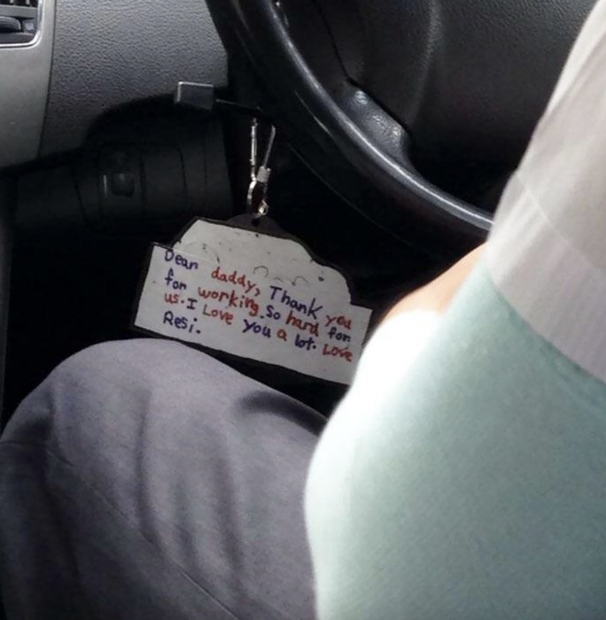 the note attached to the car keychain
