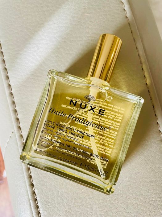 A photo shared by a reviewer showcasing the bottle of Nuxe dry oil.