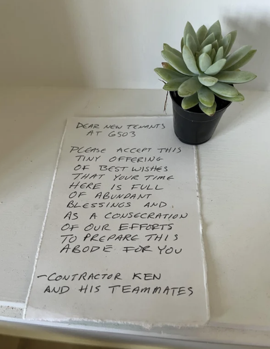the note accompanied by a small plant