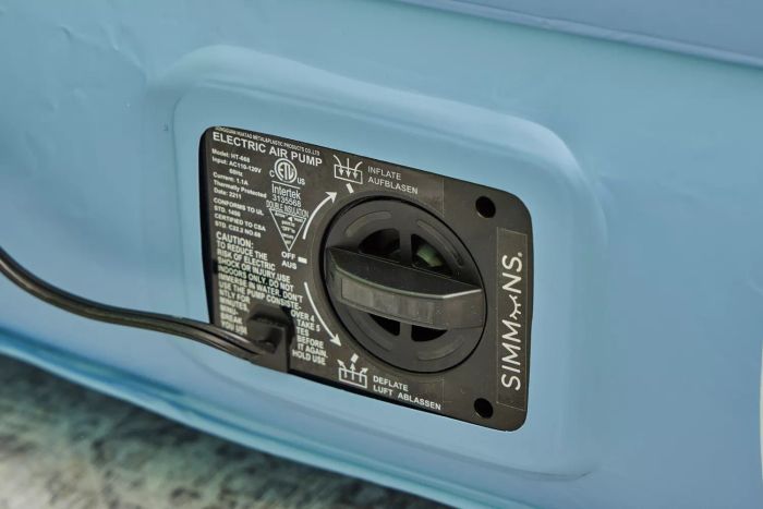 The dial and charger on the Simmons Lumbar Firm Full Tri-Zone Air Mattress are shown in close-up.