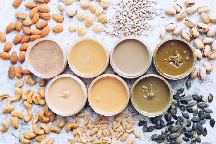 Nut and seed butters in glass jars
