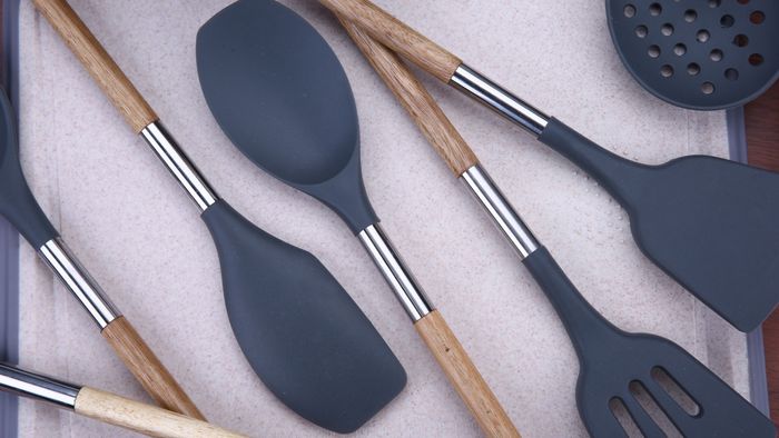 black kitchen utensils like spoons and spatulas