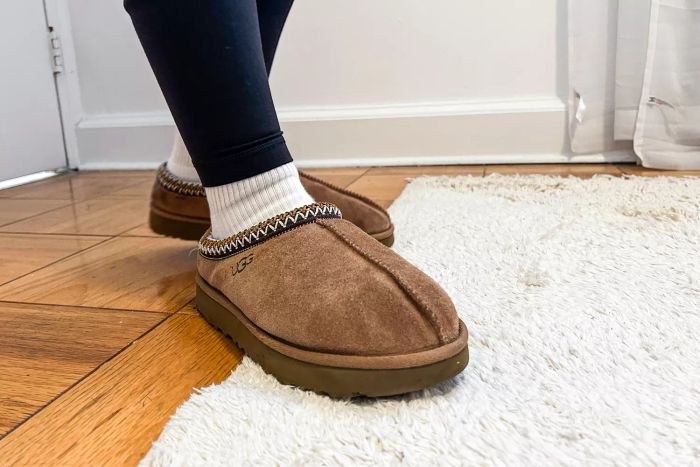 Someone wearing the Ugg Tasman slippers
