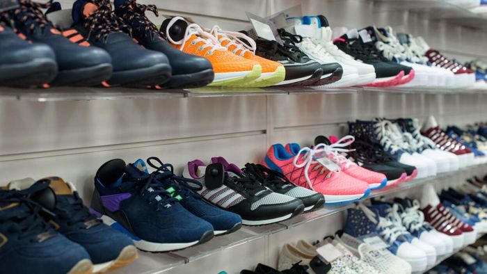 a display of running shoes at a retail store