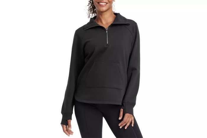 The All In Motion Women's Fleece 1/2 Zip Legging Friendly Pullover Sweatshirt offers the ultimate blend of comfort and functionality. Its fleece construction ensures warmth, and the ½ zip design makes it perfect for layering with leggings during workouts or casual wear.