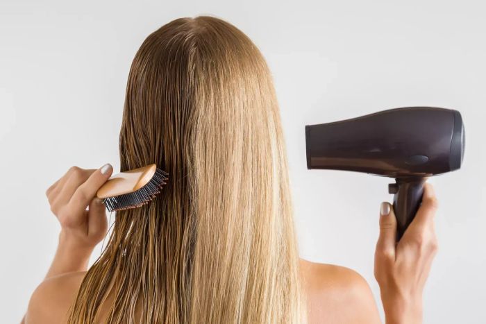 5-hair-habits-secretly-damaging-your-hair-GettyImages-858541178