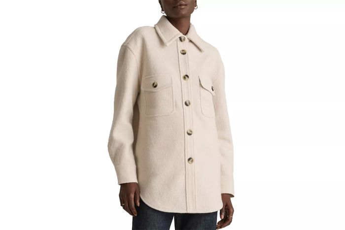 The Quince 100% Merino Wool Shirt Jacket combines luxury with versatility. Crafted from premium merino wool, this jacket offers both a sophisticated look and warmth, perfect for transitioning between seasons.