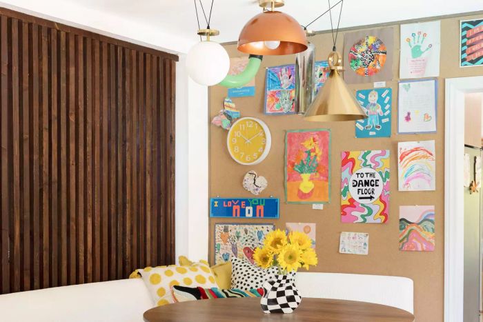 Children's drawings on the walls.