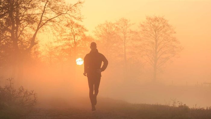 man running at dawn