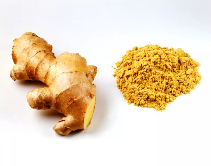 Fresh ginger root and ground ginger powder.