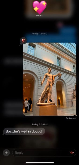A text exchange featuring an image of a classical statue with a humorous comment: "Boy... he's well in doubt!"