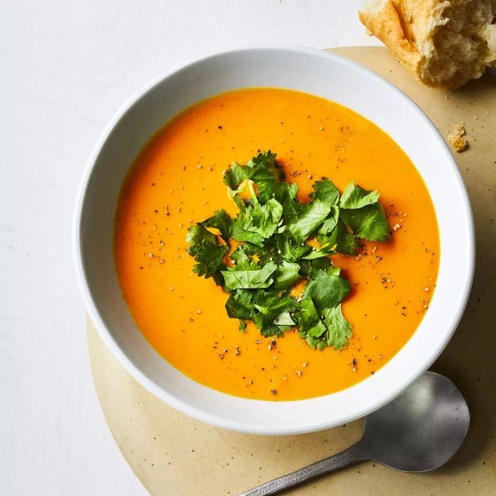 Carrot-And-Red Lentil Soup: A flavorful and comforting soup made with carrots and red lentils, perfectly spiced with cumin, turmeric, and fresh ginger to warm you up on cold days.