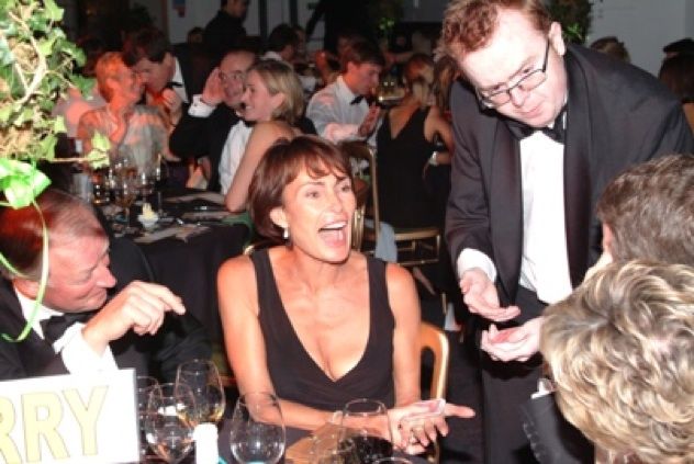 Hire-Magician-Black-Dress-Laughing