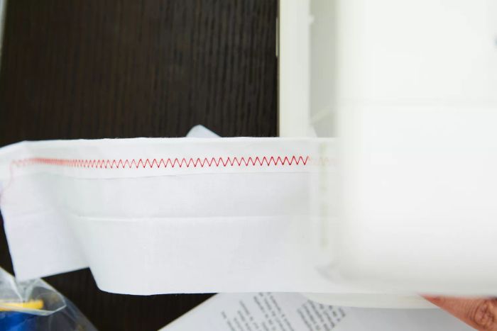 A detailed view of the intricate zigzag stitching on the Baby Lock Zest Sewing Machine.