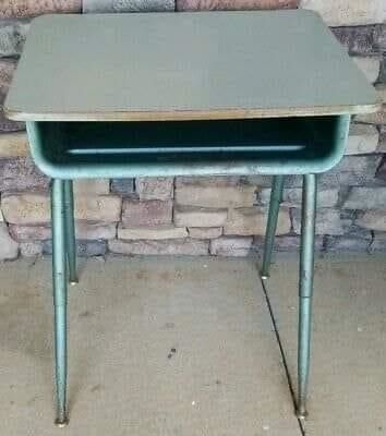 An old desk, showing signs of wear and tear.