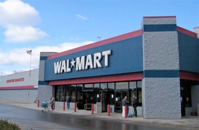 Walmart is an American multinational corporation that operates a vast network of discount department stores. As of 2008, it was ranked the world's largest public company by revenue according to the Fortune Global 500. Founded by Sam Walton in 1962 and incorporated in 1969, Walmart went public in 1972. It is also the largest private employer globally and the fourth largest employer overall, behind the British National Health Service and Indian Railways. Walmart is the leading grocery retailer in the U.S., controlling around 20% of the retail grocery and consumables market, in addition to owning Sam's Club.