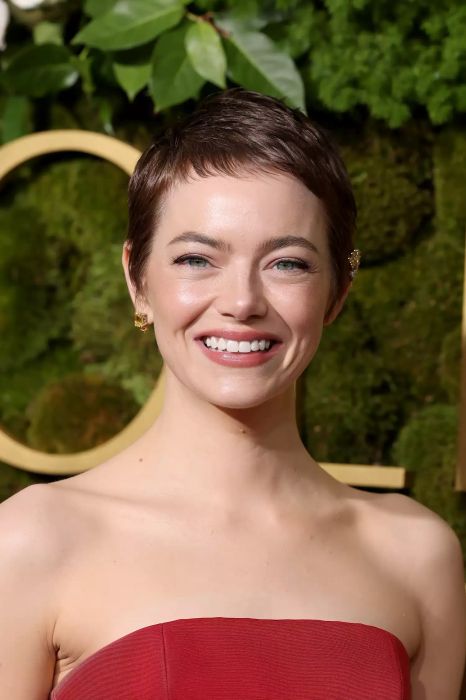 Emma Stone showcasing a 90s-inspired pixie on the red carpet