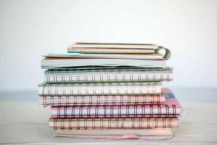 a pile of instruction booklets