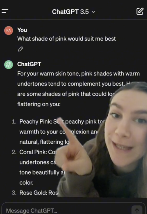 Ka points to her phone screen, displaying a response.