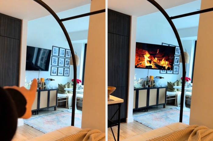 A cozy living room scene with a fireplace displayed on the TV screen, reflected in a round mirror
