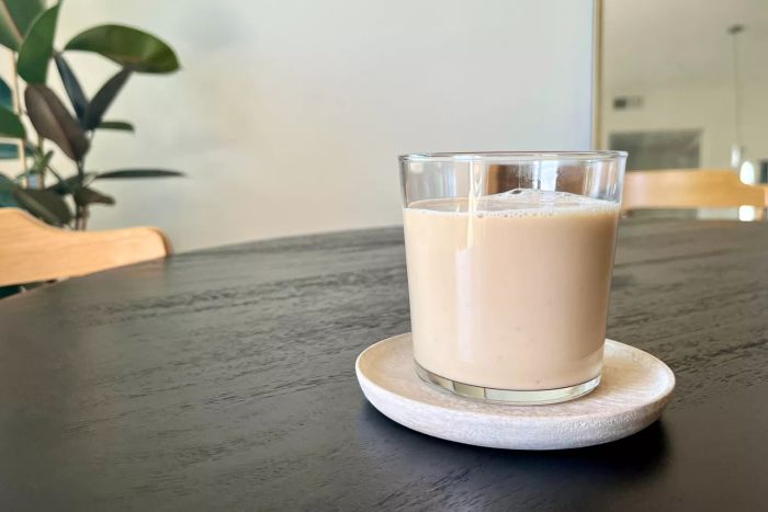 A Bormioli Rocco Bodega Collection Glassware glass of coffee resting on a table