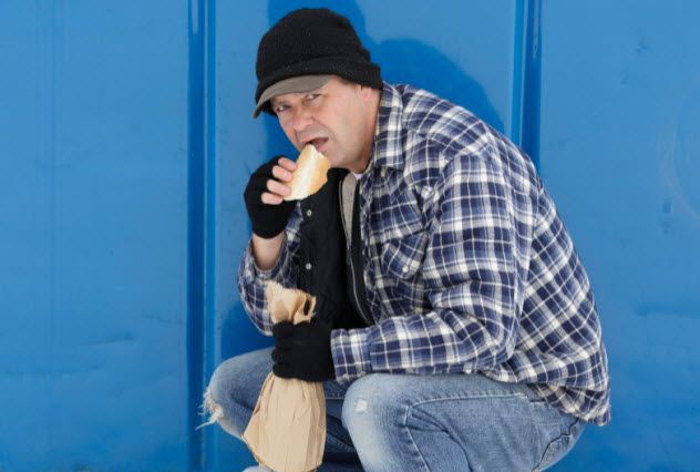 2-homeless-man-eating-bread_000008294367_Small