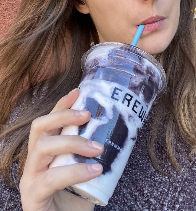 The author sipping a smoothie