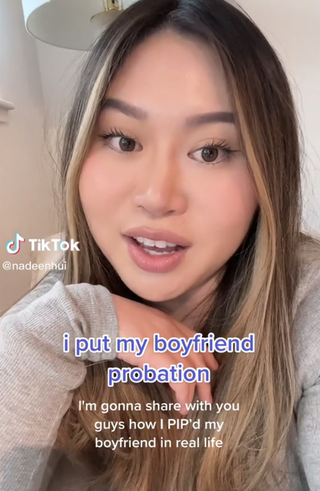 A close-up of Nadeen speaking with the caption, "I placed my boyfriend on probation. I'm going to show you how I implemented a PIP for my boyfriend in real life"