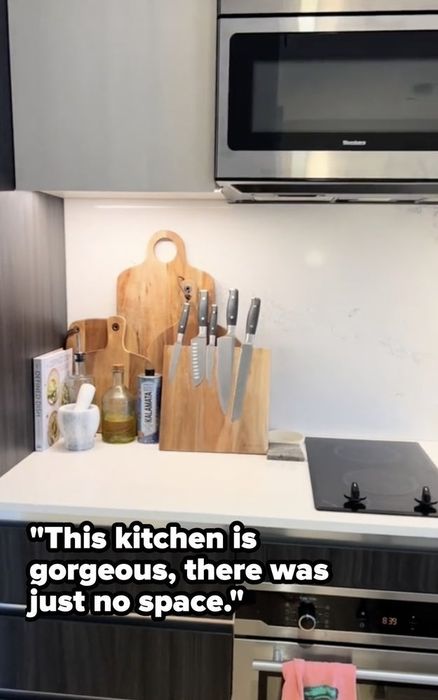 A neatly arranged kitchen counter featuring cutting boards, knives, and oil bottles; a quote highlights the kitchen’s aesthetic appeal
