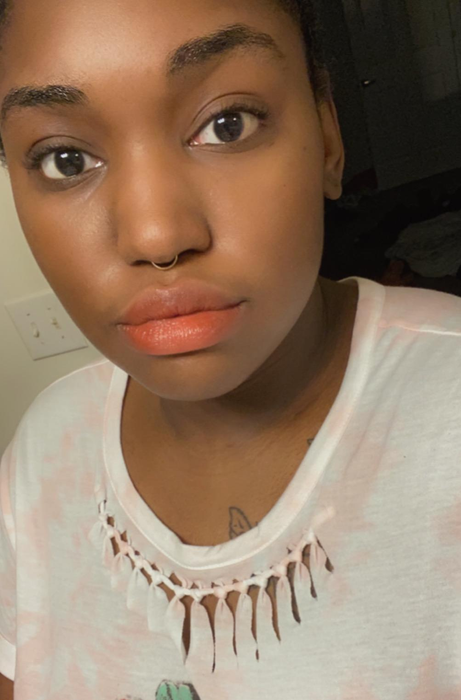 Another reviewer showcasing the red shade