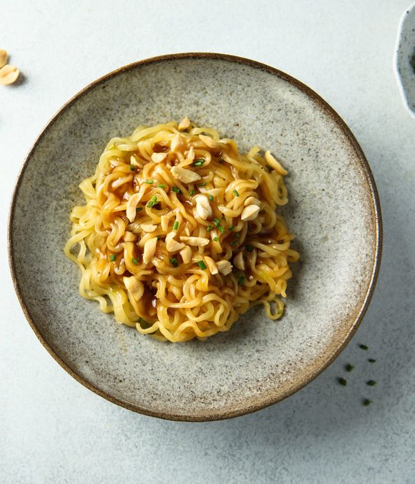 Instant noodles coated in a rich peanut sauce